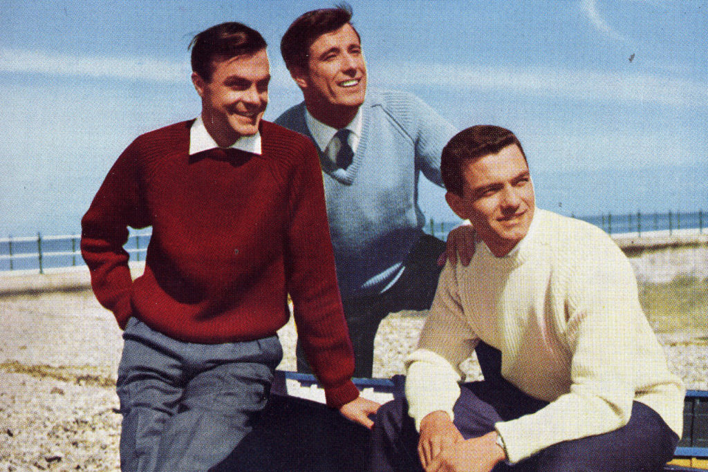 Colour image of 3 male models wearing jumpers.