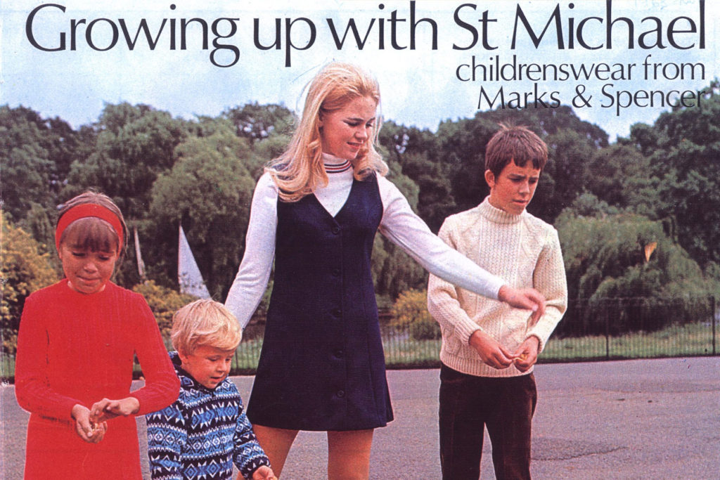 A colour image of a magazine cover showing 4 children in a park.
