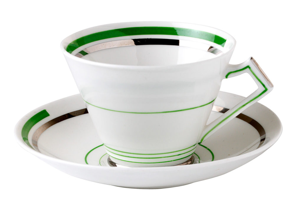 A colour image of a tea cup and saucer.