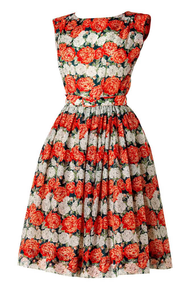 Colour image of a dress with an orange and white floral print