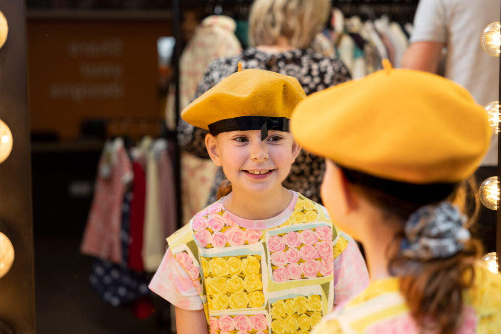 Colour image of a child in dressing up clothes