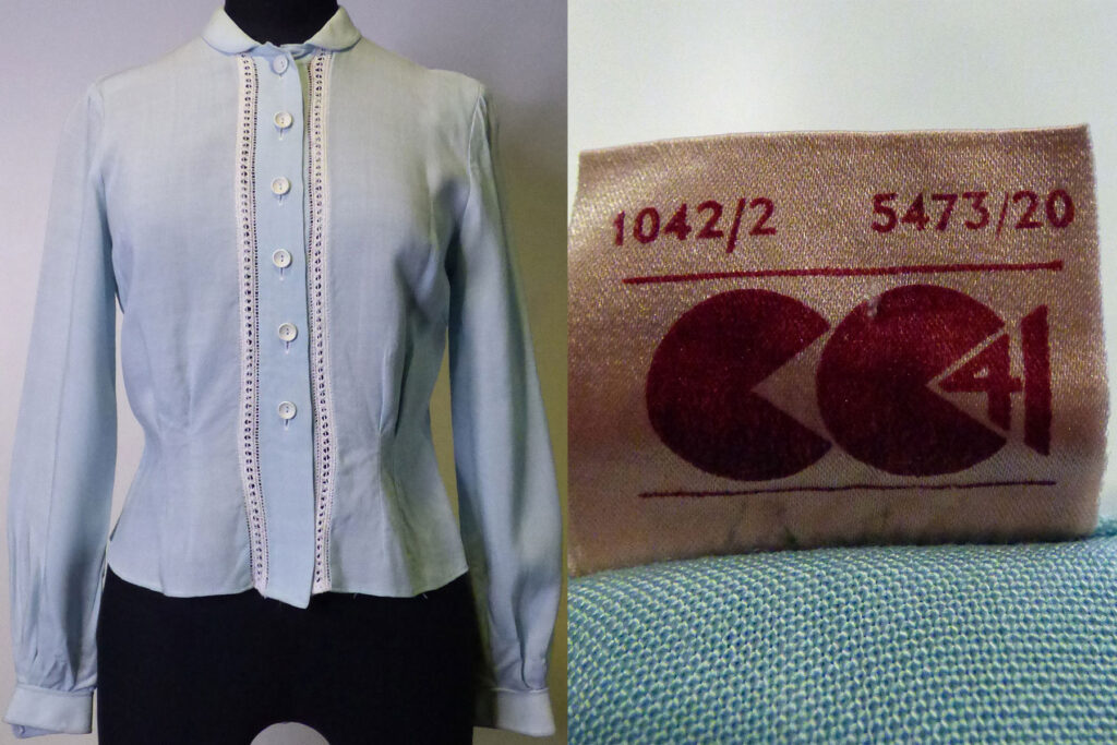 colour image of a pale blue blouse on a mannequin, with a close up of the label on the right. The label is beige with brown print, showing the CC41 logo.