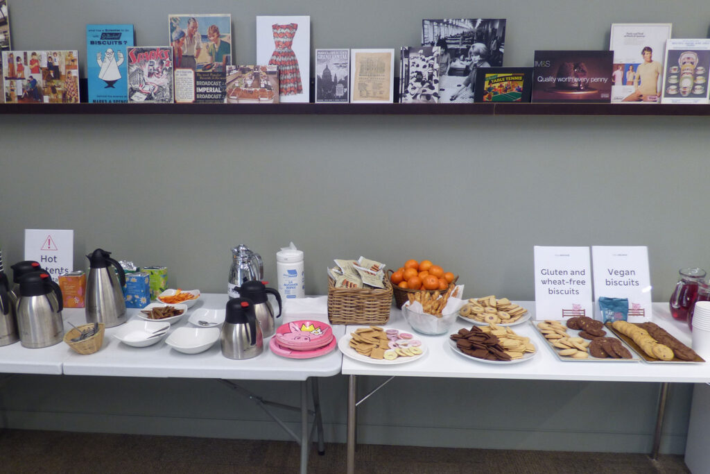 Colour image of a table of drinks and biscuits.
