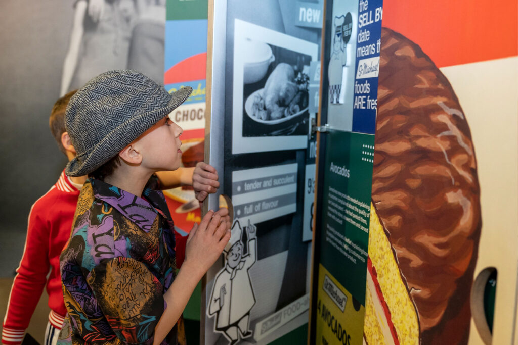 colour image of children looking at a museum display