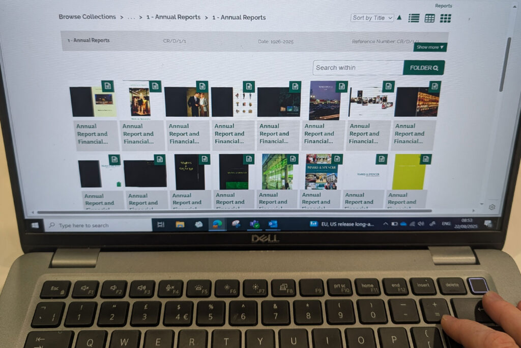 Colour photo of a laptop screen showing thumbnail images
